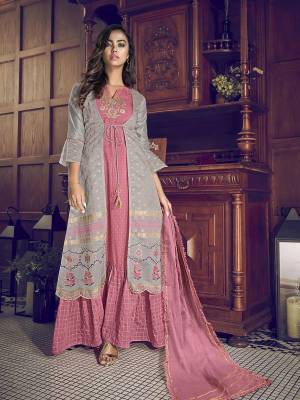 Attrective This Designer Long Length Suit In Lovely Color.Its Pretty Heavy Designer Embroidery Work Top Is Art Silk Based Paired With Cotton Fabricated Dupatta Which Gives An Attractive To The Suit.