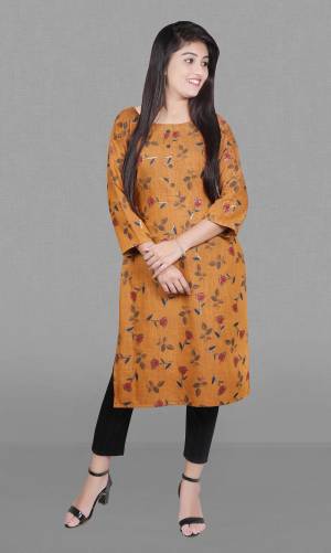 Garb This Readymade Long Kurti In Fine Color Fabricated On Rayon Slub Beautified With Foil Printed Designer. It Is Light In Weight And Easy To Carry All Day Long. 