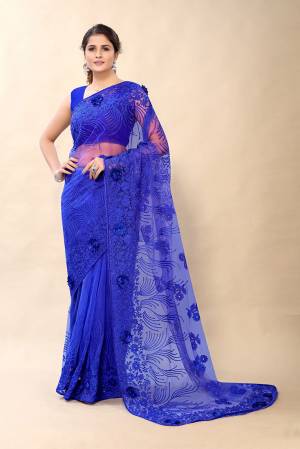 Looking This Partywear Saree Are Fine Saree Paired With Blouse.This Saree And Blouse Are Net Fabric With Heavy Designer Embroidery With Stone Work. Buy This Pretty Saree Now.