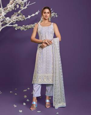 Attrective This Designer Lacknowi Long Length Suit In Lovely Light Color.Its Pretty Heavy Designer Cotton Thread,Sequance Embroidery Work Top Is Net Based Paired With Banglori Silk Bottom And Net Fabricated Dupatta Which Gives An Attractive To The Suit.