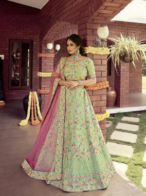 Garb This Bridal Heavy Designer Lehenga Choli In Fine Light Color Fabricated On Raw Silk Beautified Fabric Lahenga Choli With Heavy Designer Thread,Jari,Dori Embroidery Work.Buy Now. 