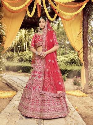 Garb This Bridal Heavy Designer Lehenga Choli In Fine Light Color Fabricated On Raw Silk Beautified Fabric Lahenga Choli With Heavy Designer Thread,Jari,Dori Embroidery Work.Buy Now. 