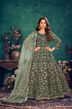 Attrective This Partywear Designer Long Length Suit In Dark Color.Its Pretty Heavy Designer Full Embroidery Work Top Is Velvet Based Paired With Santoon Bottom And Net  Fabricated Dupatta Which Gives An Attractive To The Suit.