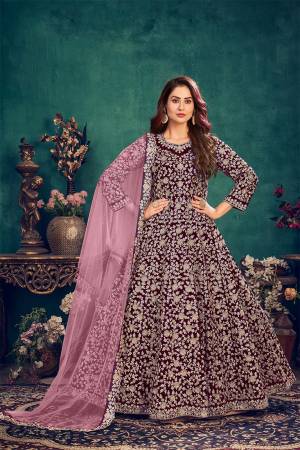 Attrective This Partywear Designer Long Length Suit In Dark Color.Its Pretty Heavy Designer Full Embroidery Work Top Is Velvet Based Paired With Santoon Bottom And Net  Fabricated Dupatta Which Gives An Attractive To The Suit.