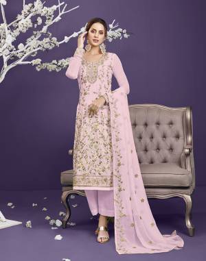 Attrective This Designer Long Length Suit In Lovely Light Color.Its Pretty Heavy Designer Thread,Jari,Sequance Embroidery Work Top Is Georgette Based Paired With Dull Santoon Bottom And Georgette Fabricated Dupatta Which Gives An Attractive To The Suit.