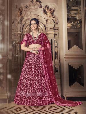 Garb This Partywear Special Designer Lehenga Choli And Dupatta In Dark Color. Blouse,Lahenga And Dupatta Are Soft Net Beautified Fabric With Heavy Thread,Sequance Embroidery Work.Buy Now. 