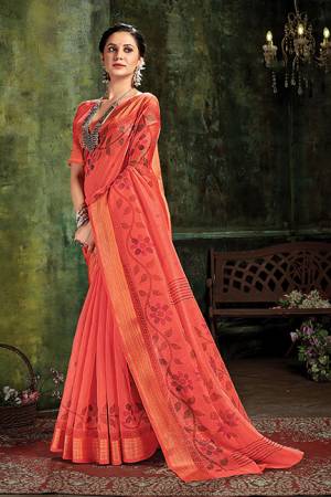 Garb This Traditional Saree Paired With Blouse.This Saree And Blouse Are Cotton Based Fabric With Wevon Designer Work. Buy This Pretty Saree Now.