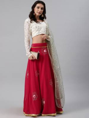 Garb This Wedding Partywear Heavy Designer Lehenga Choli And Dupatta In Fine Color Fabricated On Georgette Beautified With Heavy Attractive Thread,Sequance Embroidery Work. 