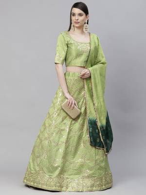 Garb This Wedding Partywear Heavy Designer Lehenga Choli And Dupatta In Fine Color Fabricated On Art Silk Beautified With Heavy Attractive Thread,Sequance Embroidery Work. 