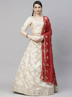 Garb This Wedding Partywear Heavy Designer Lehenga Choli And Dupatta In Fine Color Fabricated On Art Silk Beautified With Heavy Attractive Thread,Sequance Embroidery Work. 