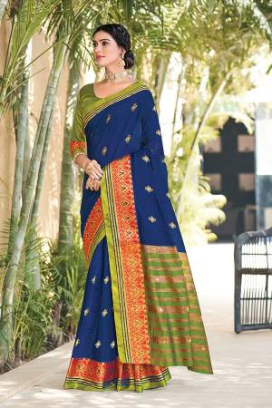 This Traditional Saree Paired With Blouse.This Saree And Blouse Are Cotton Based Fabric With Wevon Jari Designer Work. Buy This Pretty Saree Now.