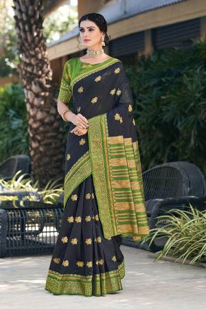 This Traditional Saree Paired With Blouse.This Saree And Blouse Are Cotton Based Fabric With Wevon Jari Designer Work. Buy This Pretty Saree Now.