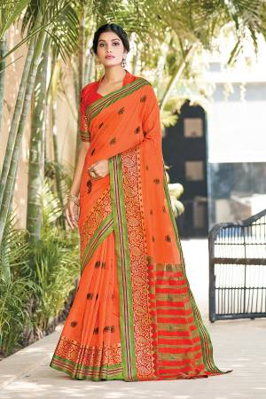 This Traditional Saree Paired With Blouse.This Saree And Blouse Are Cotton Based Fabric With Wevon Jari Designer Work. Buy This Pretty Saree Now.