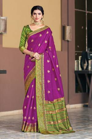 This Traditional Saree Paired With Blouse.This Saree And Blouse Are Cotton Based Fabric With Wevon Jari Designer Work. Buy This Pretty Saree Now.