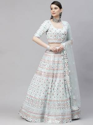 Attrective This Wedding Partywear Heavy Designer Lahenga Choli In Georgette And Dupatta Net In Fabricated Beautified With Attrective Multy Thread, Gota Patti Embroidery With Diamond Work.Buy Now. 