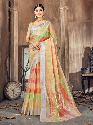 Garb This Pretty Angelic Look Wearing This Wevon Designer Saree In Fine Color Paired With Blouse. This Saree And Blouse Is Cotton Silk Fabricated. Its Pretty Color Pallete Will Give An Attractive Look To Your Personality. 