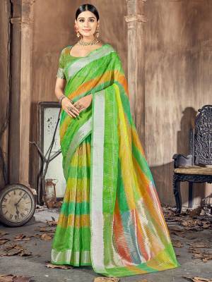 Garb This Pretty Angelic Look Wearing This Wevon Designer Saree In Fine Color Paired With Blouse. This Saree And Blouse Is Cotton Silk Fabricated. Its Pretty Color Pallete Will Give An Attractive Look To Your Personality. 