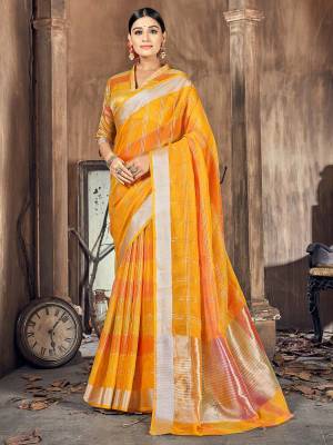 Garb This Pretty Angelic Look Wearing This Wevon Designer Saree In Fine Color Paired With Blouse. This Saree And Blouse Is Cotton Silk Fabricated. Its Pretty Color Pallete Will Give An Attractive Look To Your Personality. 