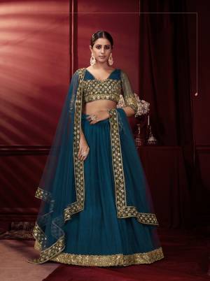 This Wedding Season, Be The Most Attractive Wearing This Heavy Designer Lehenga?Choli In Beautifull Colored Paired With Pretty Blouse And Dupatta. Its Blouse And Lehenga Are Net With Satin Based Paired With Net Fabricated Dupatta.Grab This lovely Collection Now