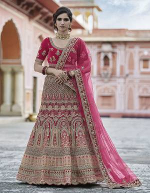 Garb This Bridal Heavy Designer Lehenga Choli In Fine Color Fabricated On Velvet Beautified Fabric Lahenga Choli With Heavy Designer Embroidery With Hand Work.Buy Now. 