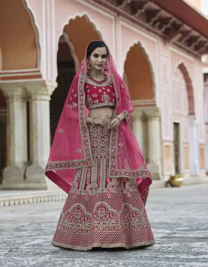 Garb This Bridal Heavy Designer Lehenga Choli In Fine Color Fabricated On Velvet Beautified Fabric Lahenga Choli With Heavy Designer Embroidery With Hand Work.Buy Now. 