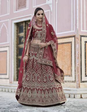 Garb This Bridal Heavy Designer Lehenga Choli In Fine Color Fabricated On Velvet Beautified Fabric Lahenga Choli With Heavy Designer Embroidery With Hand Work.Buy Now. 