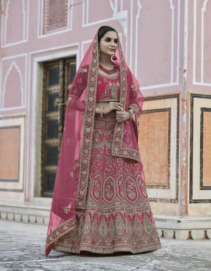 Garb This Bridal Heavy Designer Lehenga Choli In Fine Color Fabricated On Velvet Beautified Fabric Lahenga Choli With Heavy Designer Embroidery With Hand Work.Buy Now. 