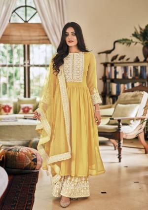 Looking This Designer Plazzo Suit In Fine Color.Its Pretty Heavy Designer Thread Embroidery Work Top Is Faux Georgette Based Paired With Georgette Bottom And Soft Net Fabricated Dupatta Which Gives An Attractive To The Suit.