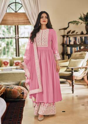 Looking This Designer Plazzo Suit In Fine Color.Its Pretty Heavy Designer Thread Embroidery Work Top Is Faux Georgette Based Paired With Georgette Bottom And Soft Net Fabricated Dupatta Which Gives An Attractive To The Suit.