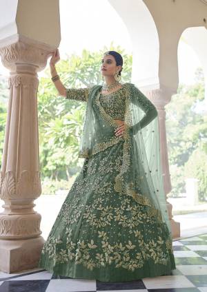 Looking This Bridal Heavy Designer Lehenga Choli In Fine Light Color Fabricated On Soft Net Beautified Fabric With Heavy Designer Sequance,Dori Embroidery Work.Buy Now. 