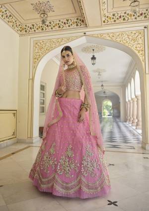 Looking This Bridal Heavy Designer Lehenga Choli In Fine Light Color Fabricated On Soft Net Beautified Fabric With Heavy Designer Sequance,Dori Embroidery Work.Buy Now. 