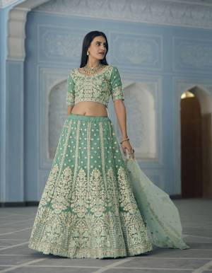 Garb This Wedding Partywear Heavy Designer Lehenga Choli In Fine Light Color Fabricated On Organza Beautified Fabric With Heavy Designer Embroidery Work.Buy Now. 