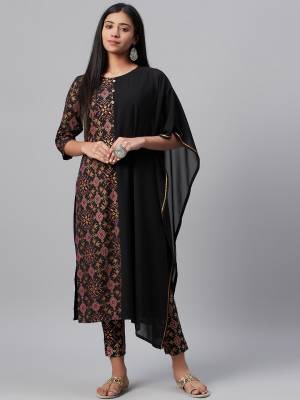 Attrective This Readymade Long Kurti With Bottom In Fine Color Fabricated On Georgette & Crepe Beautified With Designer Foil Printed. It Is Light In Weight And Easy To Carry All Day Long. 