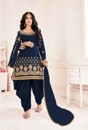 Attrective This Partywear Designer Patiyala Suit In Lovely Color.Its Pretty Designer Embroidery With Real Mirror Work Top Is Bitalian Soft Silk Based Paired With Bitalian Soft Silk Bottom And Net Fabricated Dupatta Which Gives An Attractive To The Suit.