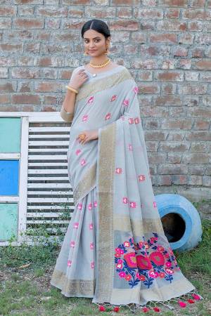 Attrective This Partywear Saree Paired With Blouse.This Saree And Blouse Are Handloom Linen Based Fabric With Heavy Wevon Meenakari Designer Work. Buy This Pretty Saree Now.