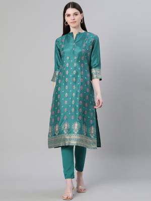 Looking This Readymade Long Kurti With Bottom In Fine Color. Kurti And Pant Are Fabricated On Poly Silk Beautified With Designer Foil Printed. It Is Light In Weight And Easy To Carry All Day Long. 