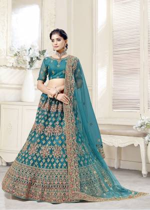 Lovely This Bridal Partywear Heavy Designer Lehenga Choli In Fine Color Fabricated On Net Beautified Fabric Lahenga Choli With Heavy Attrective Designer Dori,Thread Embroidery With Diamond Work.Buy Now. 