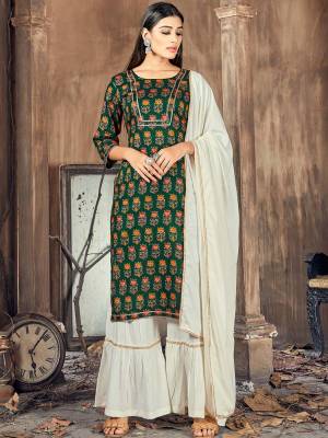 Greb This Readymade Plazzo Suits In Fine Color Top And Dupatta Are Rayon With Dupatta Are Rayon Fabricated Beautified With Printed Designer. It Is Light In Weight And Easy To Carry All Day Long. 