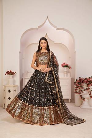 Stylist This Partywear Heavy Designer Lahenga Choli In Fine Color.This  Lahenga Choli Are Mono Net Fabricated Beautified With Attrective Cotton Thread,Jari,Sendwitch Sequance Embroidery With Fancy Lace.Buy Now. 