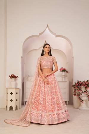 Stylist This Partywear Heavy Designer Lahenga Choli In Fine Color.This  Lahenga Choli Are Mono Net Fabricated Beautified With Attrective Cotton Thread,Jari,Sendwitch Sequance Embroidery With Fancy Lace.Buy Now. 