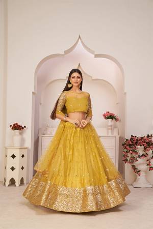 Stylist This Partywear Heavy Designer Lahenga Choli In Fine Color.This  Lahenga Choli Are Mono Net Fabricated Beautified With Attrective Cotton Thread,Jari,Sendwitch Sequance Embroidery With Fancy Lace.Buy Now. 