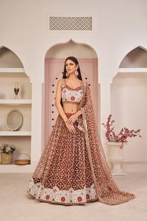 Stylist This Partywear Heavy Designer Lahenga Choli In Fine Color.This  Lahenga Choli Are Mono Net Fabricated Beautified With Attrective Cotton Thread,Jari,Sendwitch Sequance Embroidery With Fancy Lace.Buy Now. 