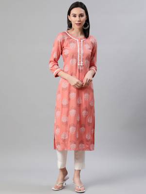 Looking This Readymade Long Kurti With Bottom In Fine Color. This Kurti And Pant Are Fabricated On Rayon Beautified With Designer Khadi Printed. It Is Light In Weight And Easy To Carry All Day Long. 