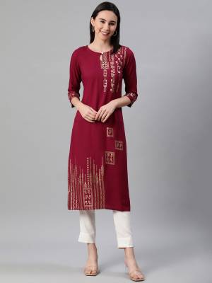 Looking This Readymade Long Kurti With Bottom In Fine Color. This Kurti And Pant Are Fabricated On Rayon Beautified With Designer Foil Printed. It Is Light In Weight And Easy To Carry All Day Long. 