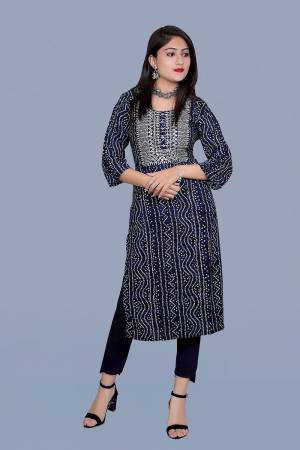 Attrective This Readymade Long Kurti In Fine Color Fabricated On Rayon Beautified With Bandhani Printed Designer With Embroidery Work. It Is Light In Weight And Easy To Carry All Day Long. 