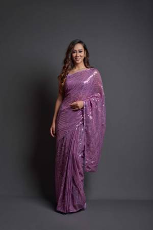 Looking This Designer Fancy Saree Paired With Blouse.This Saree Are Georgette And Blouse Are Banglori Silk Based Fabric With Designer Sequance Embroidery Work. Buy This Pretty Saree Now.