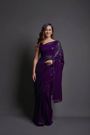 Attrective This Designer Partywear Saree Are Fine Dark Color Saree Paired With Blouse.This Saree Are Georgette And Blouse Are Banglori Silk Based Fabric With Heavy Designer Sequance Embroidery Work. Buy This Pretty Saree Now.