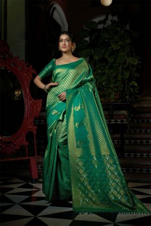 For A Proper Traditional Look , Grab This Pretty Saree In Beautifull Color Paired With Lovely Colored Blouse. This Saree Is Fabricated On Raw Silk Paired With Raw Silk Blouse Buy These Pretty Saree Collection Now