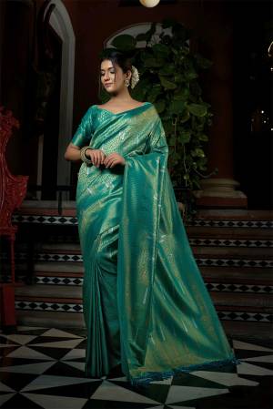 For A Proper Traditional Look , Grab This Pretty Saree In Beautifull Color Paired With Lovely Colored Blouse. This Saree Is Fabricated On Raw Silk Paired With Raw Silk Blouse Buy These Pretty Saree Collection Now