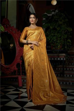 For A Proper Traditional Look , Grab This Pretty Saree In Beautifull Color Paired With Lovely Colored Blouse. This Saree Is Fabricated On Raw Silk Paired With Raw Silk Blouse Buy These Pretty Saree Collection Now